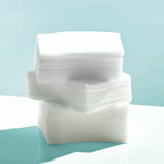 Anua Cotton Pad For Toner on blue background