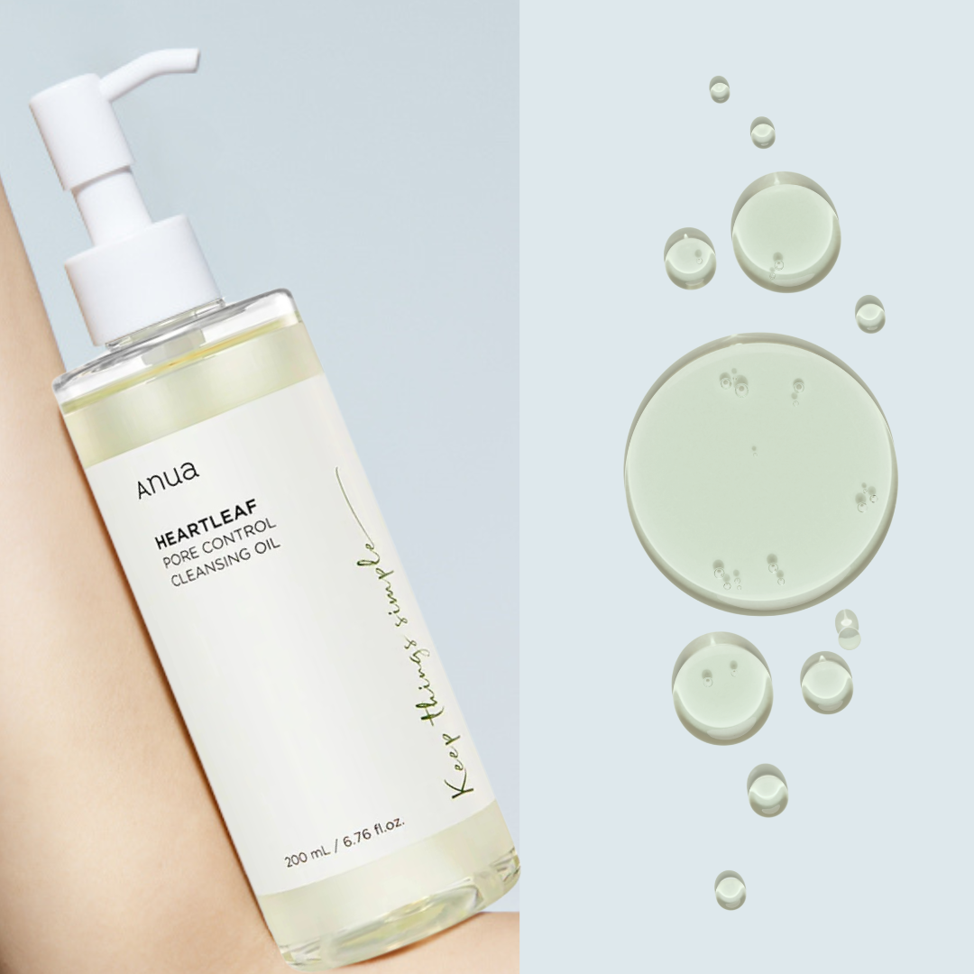 Anua Heartleaf Pore Control Cleansing Oil bottle with oil droplets on a light blue background