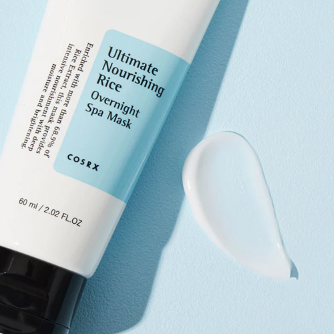 COSRX Ultimate Nourishing Rice Overnight Spa Mask on a light blue background showing product texture