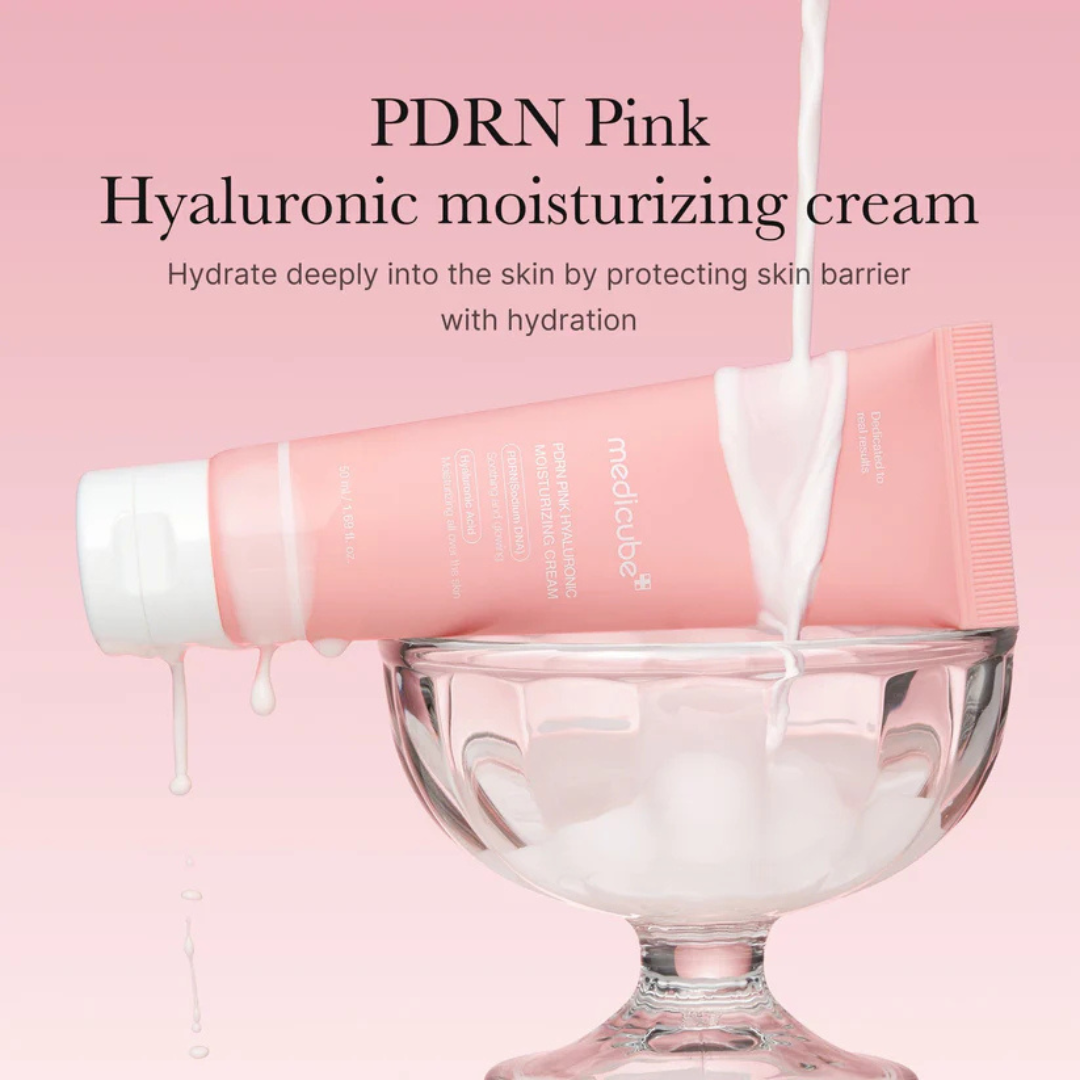 Medicube PDRN Hyaluronic Moisturizing Cream being poured into a glass bowl with a pink background and text.