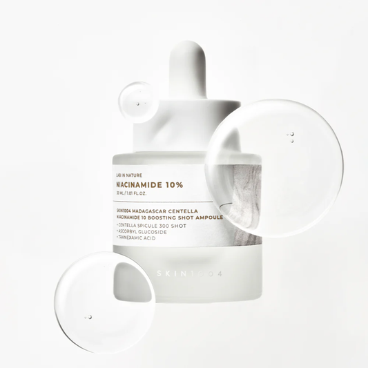 SKIN1004 Niacinamide 10 Boosting Shot Ampoule on white background with serum bubbles