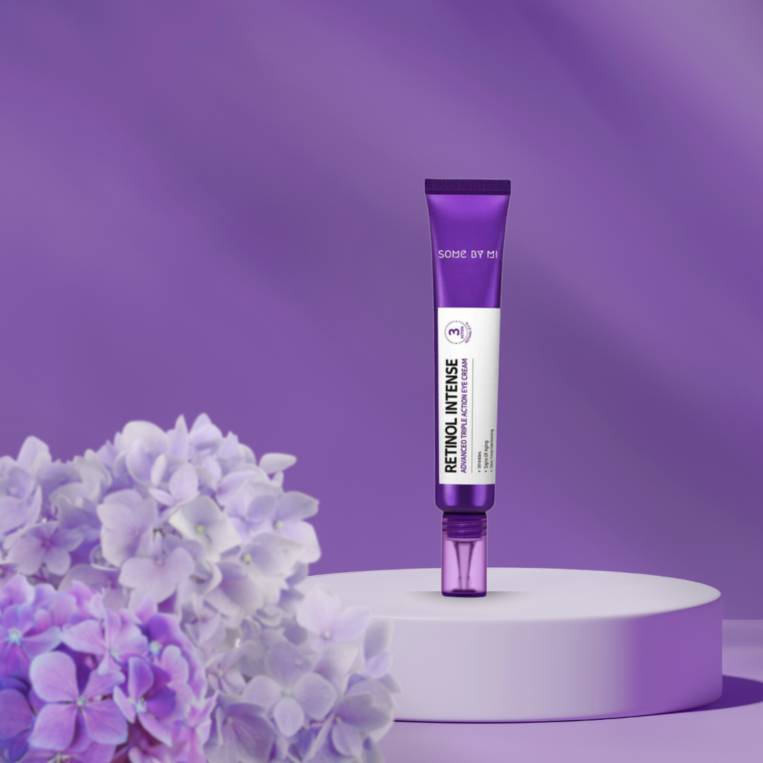 SOME BY MI Retinol Intense Advanced Triple Action Eye Cream on a purple background with hydrangea flower