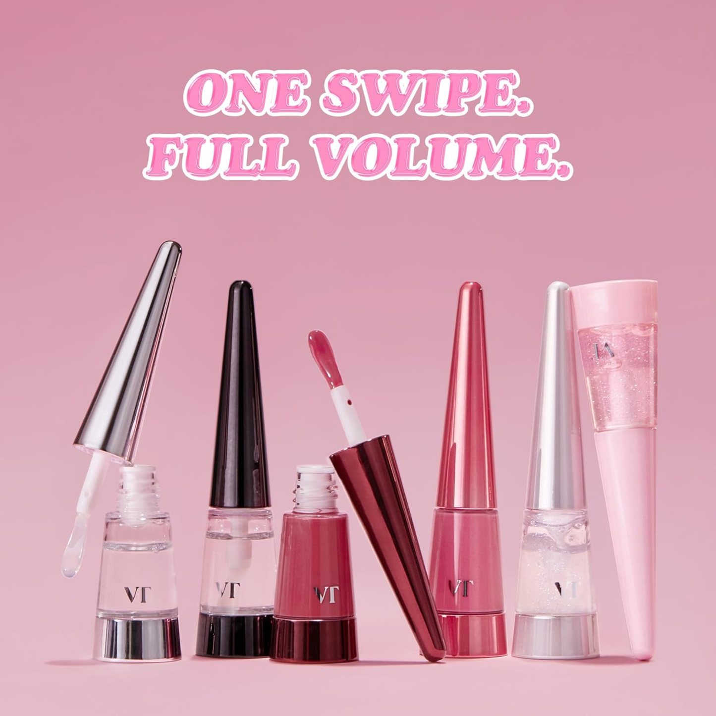Set of VT Cosmetics Reedle Shot Lip Plumper products with 'ONE SWIPE. FULL VOLUME.' text on a pink background