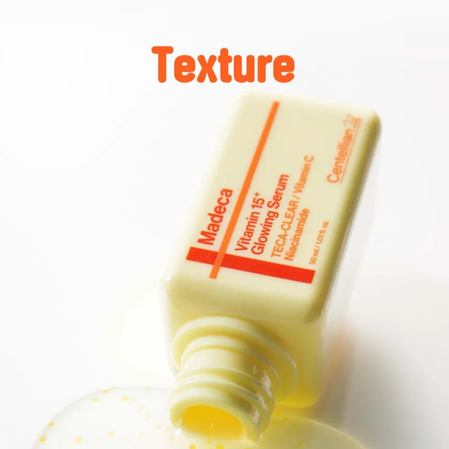 Yellow bottle of Centellian24 Madeca Vitamin 15+ Glowing Serum with orange label on a white background, labeled 'Texture'.