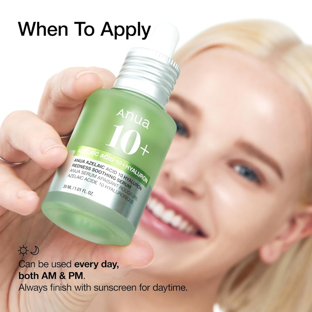 Person holding Anua Azelaic Acid 10 Hyaluron Redness Soothing Serum bottle with application instructions.