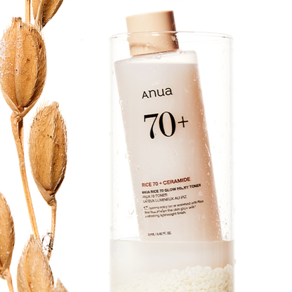 Anua Rice 70 Glow Milky Toner with rice 70+ and ceramide on a white background