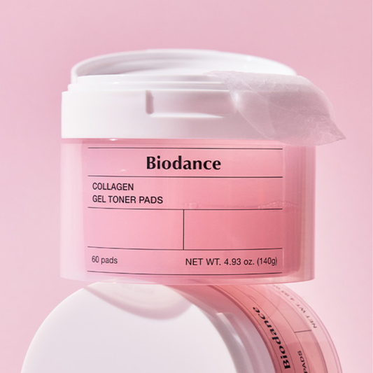 Biodance Collagen Gel Toner Pads in a translucent pink jar with a white lid, shown on a soft pink background with a second jar partially visible below.