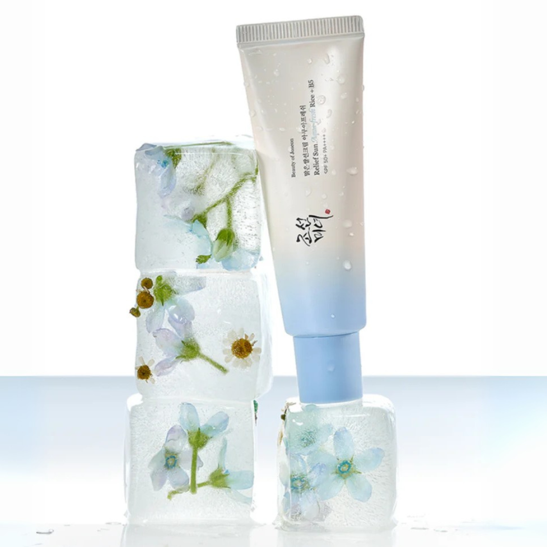 Beauty of Joseon Relief Sun Aqua-Fresh: Rice + B5 SPF50+ PA++++ with visible brand on a light background as well as flowers in ice cubes