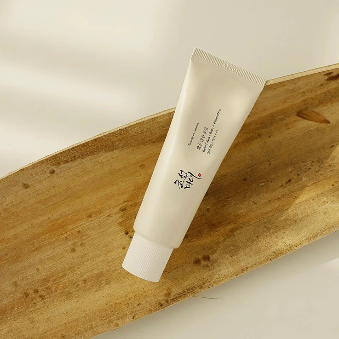 Beauty of Joseon Relief Sun: Rice + Probiotics SPF 50+ PA++++ styled on a wooden plank