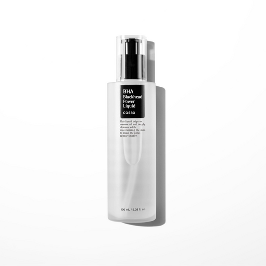 A bottle of COSRX BHA Blackhead Power Liquid with a white and transparent design, labeled with the product information.