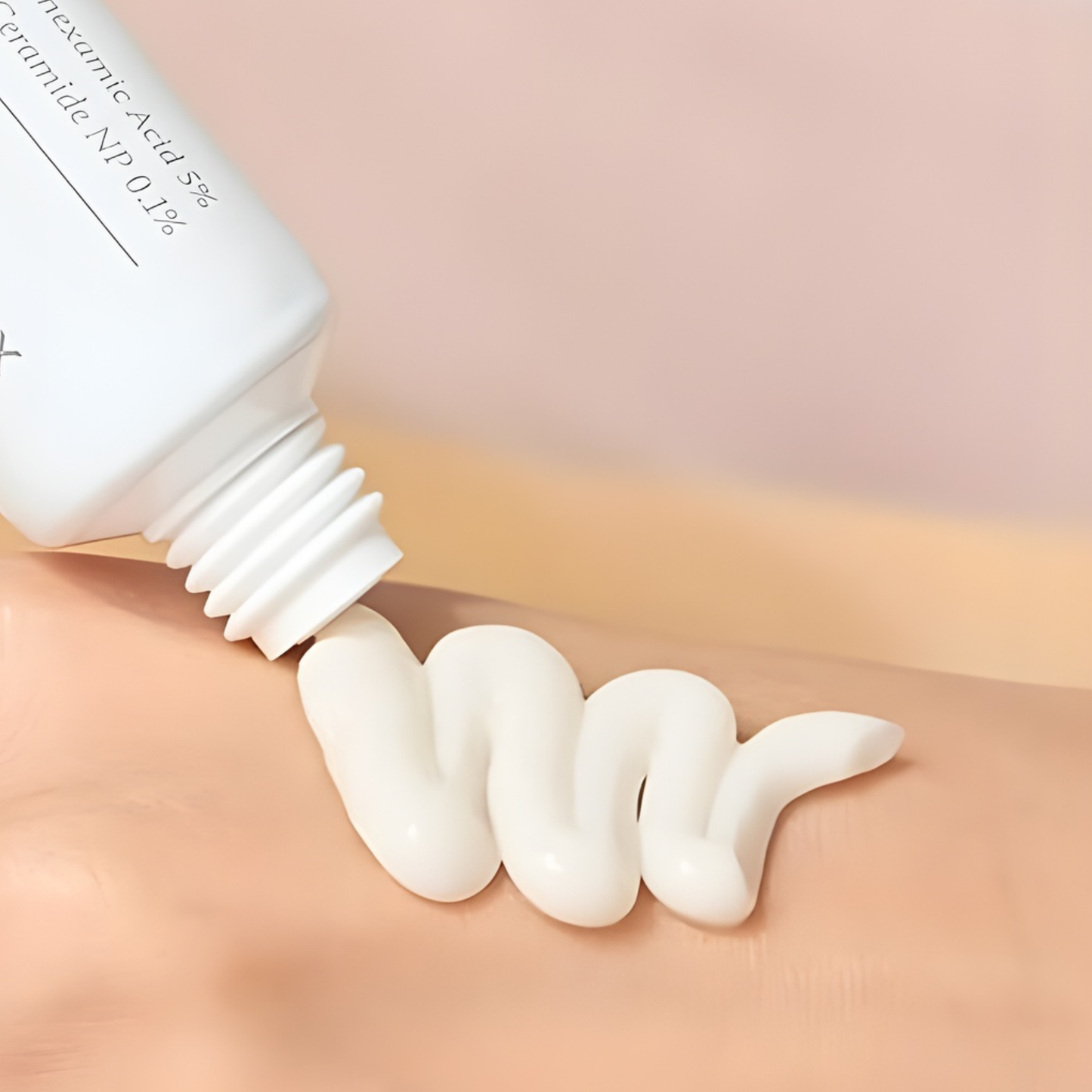 Celimax Pore+Dark Spot Brightening Cream being pressed from a tube onto a hand