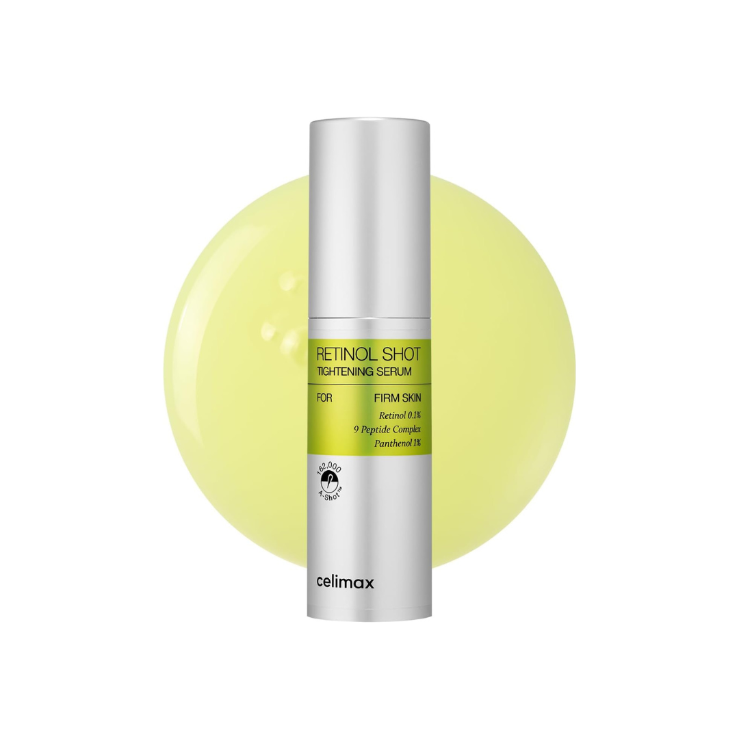 Celimax The Vita A Retinol Shot Tightening Serum on a white background with yellow serum drop in the background
