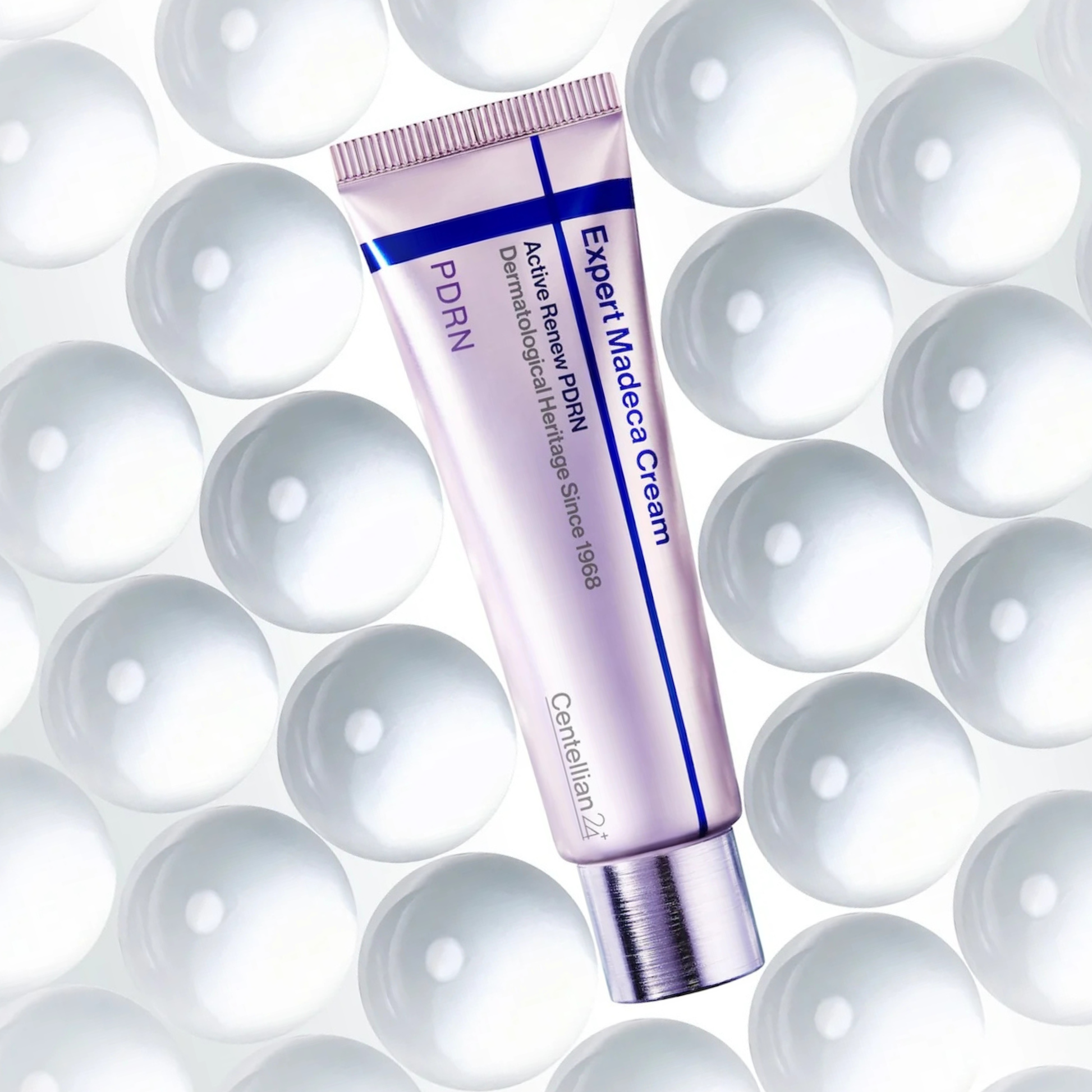 Centellian24 Expert Madeca Cream Active Renew PDRN tube on a background of white spheres