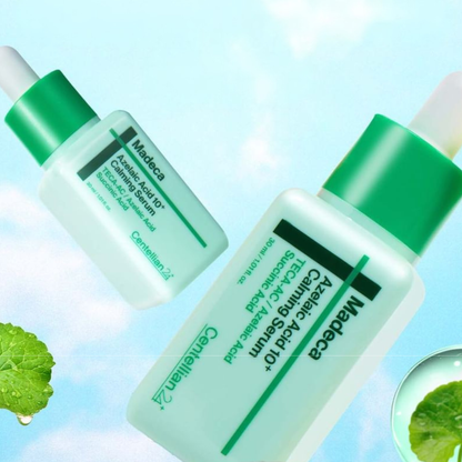Two Centellian24 Madeca Azelaic Acid 10+ Calming Serum bottles with green caps on a light blue background.