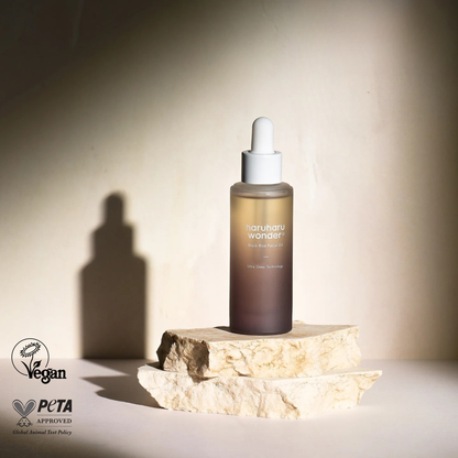 HaruHaru Wonder Black Rice Facial Oil on a natural background with the PeTA Approves logo and Vegan Logo