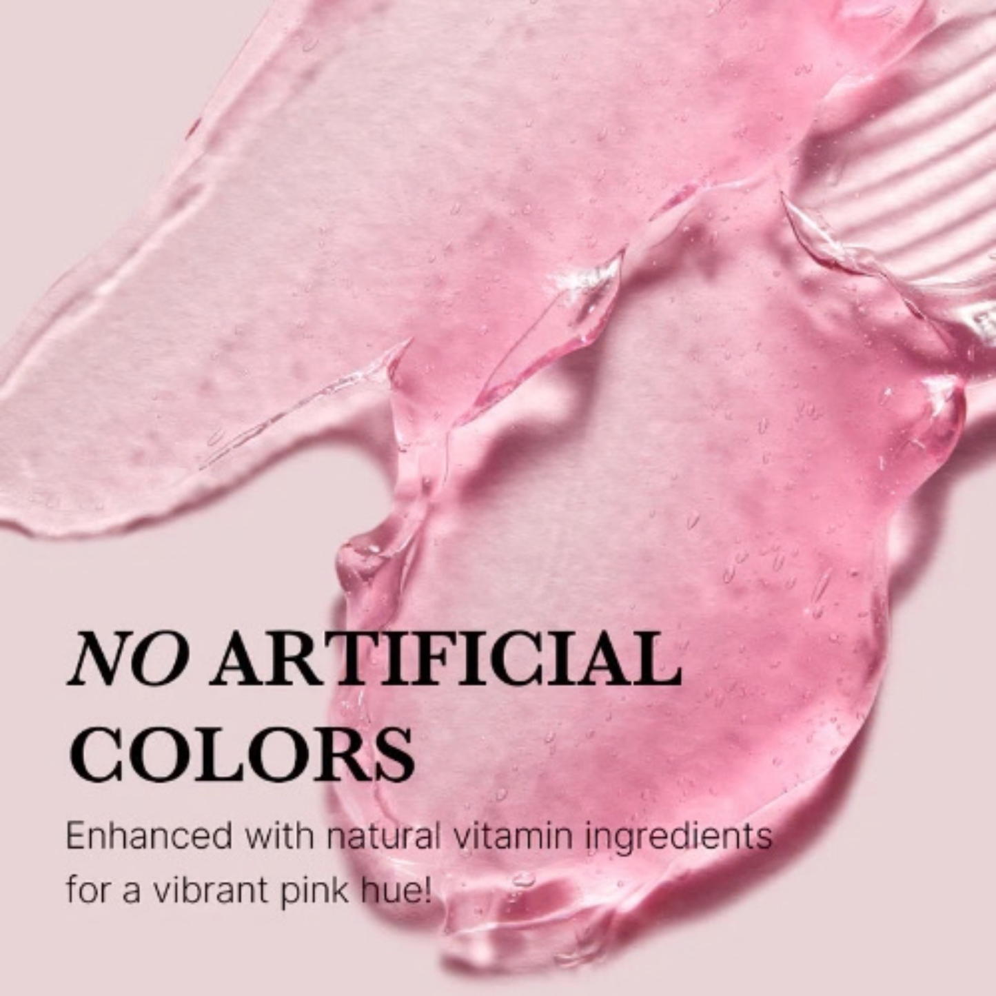 Close up of Medicube Collagen Jelly Cream smear with text about natural vitamin ingredients giving the cream a pink hue on a light pink background