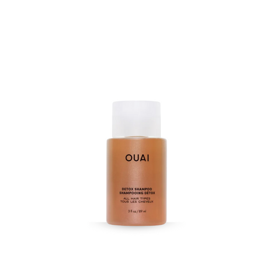 OUAI detox shampoo bottle on a white background