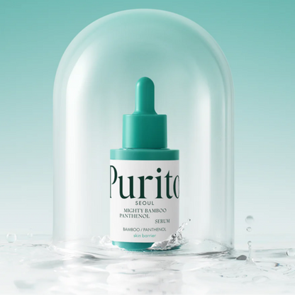 Purito Mighty Bamboo Panthenol Serum bottle under a glass dome on a light teal background