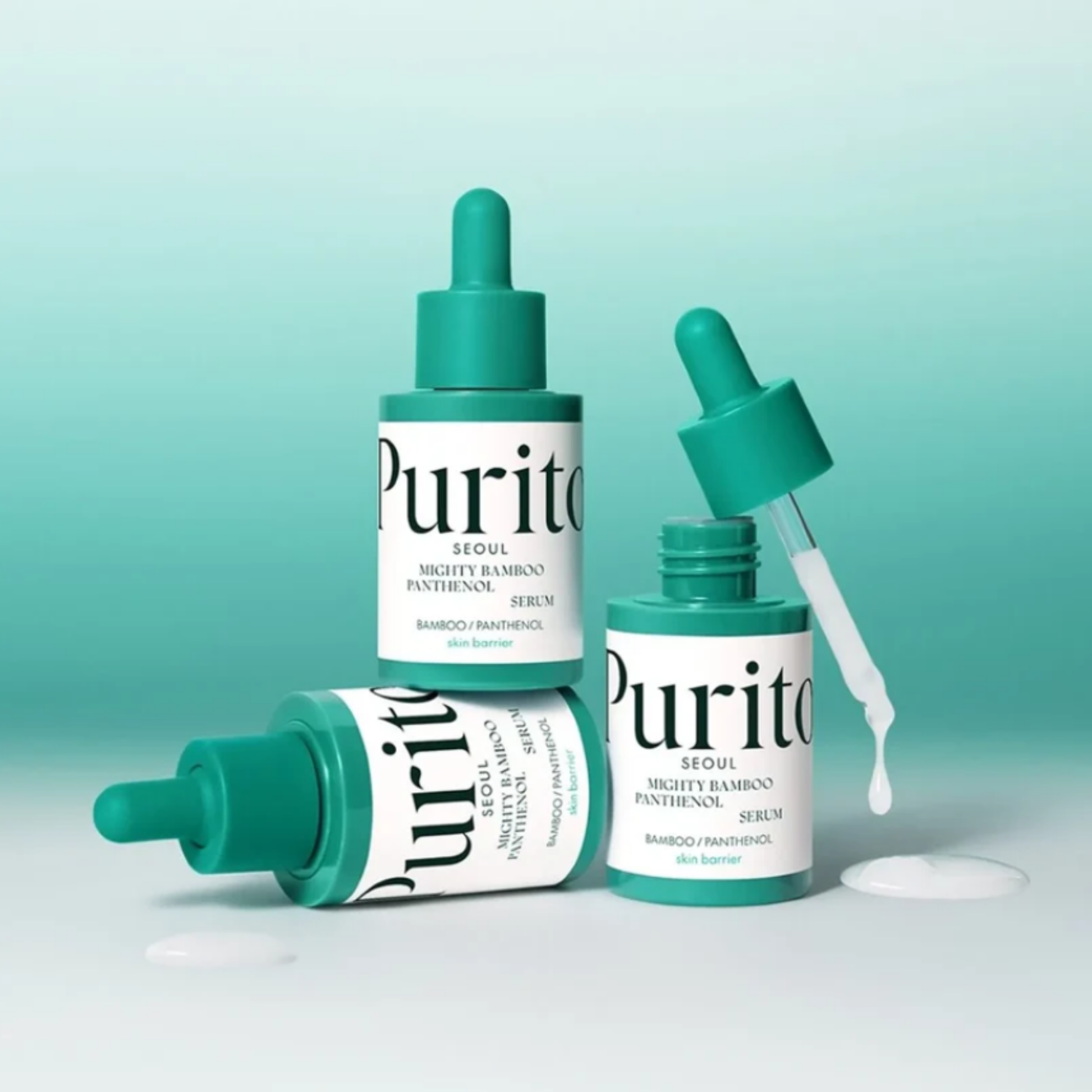 Three Purito Mighty Bamboo Panthenol Serum bottles with droppers on a light green background