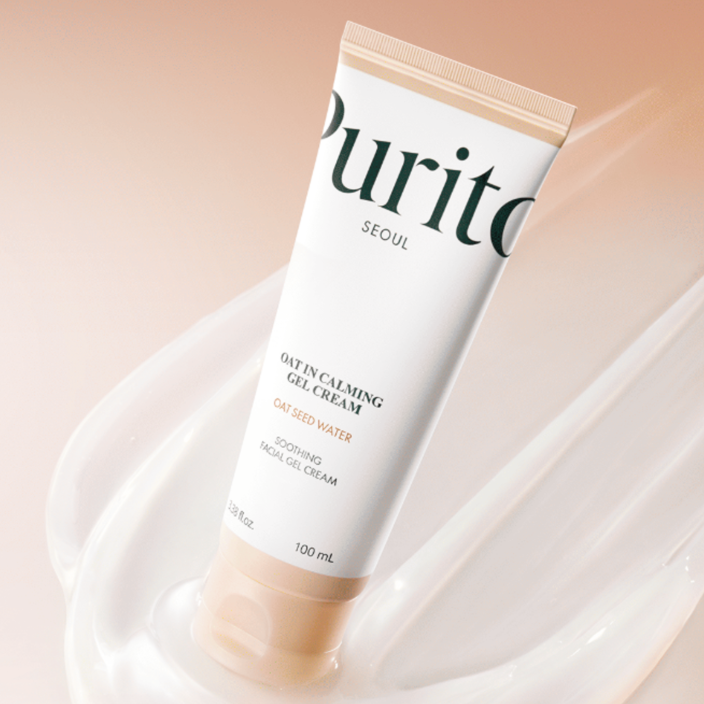 Tube of Purito Oat-In Calming Gel Cream on a soft pink background with a gel cream smear