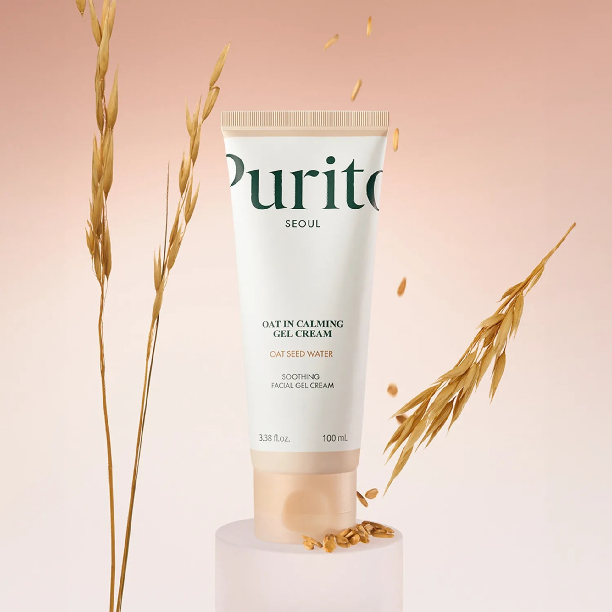 Purito Seoul Oat in Calming Gel Cream with oat branches on a light pink background