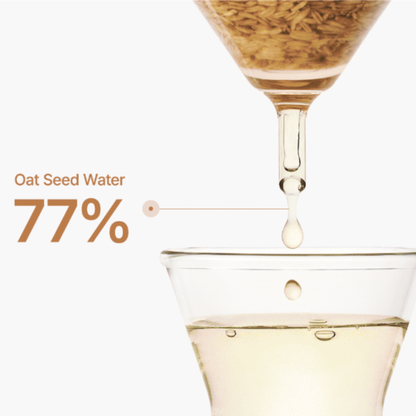 Glass of oat seed water with a droplet and text indicating the 77% oat seed content in the Purito Seoul Oat in Calming Gel Cream