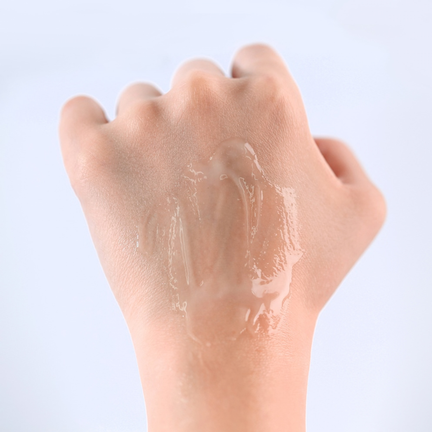 Close up of hand with Pyunkang Yul ATO Moisturising Soothing Gel Lotion applied to the back of it.
