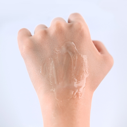 Close up of hand with Pyunkang Yul ATO Moisturising Soothing Gel Lotion applied to the back of it.