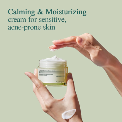 Hand holding a jar of Pyunkang Yul Calming Moisture Barrier Cream with a dollop of cream on the back of her hand. Text about calming and moisturising for sensitive and acne prone skin