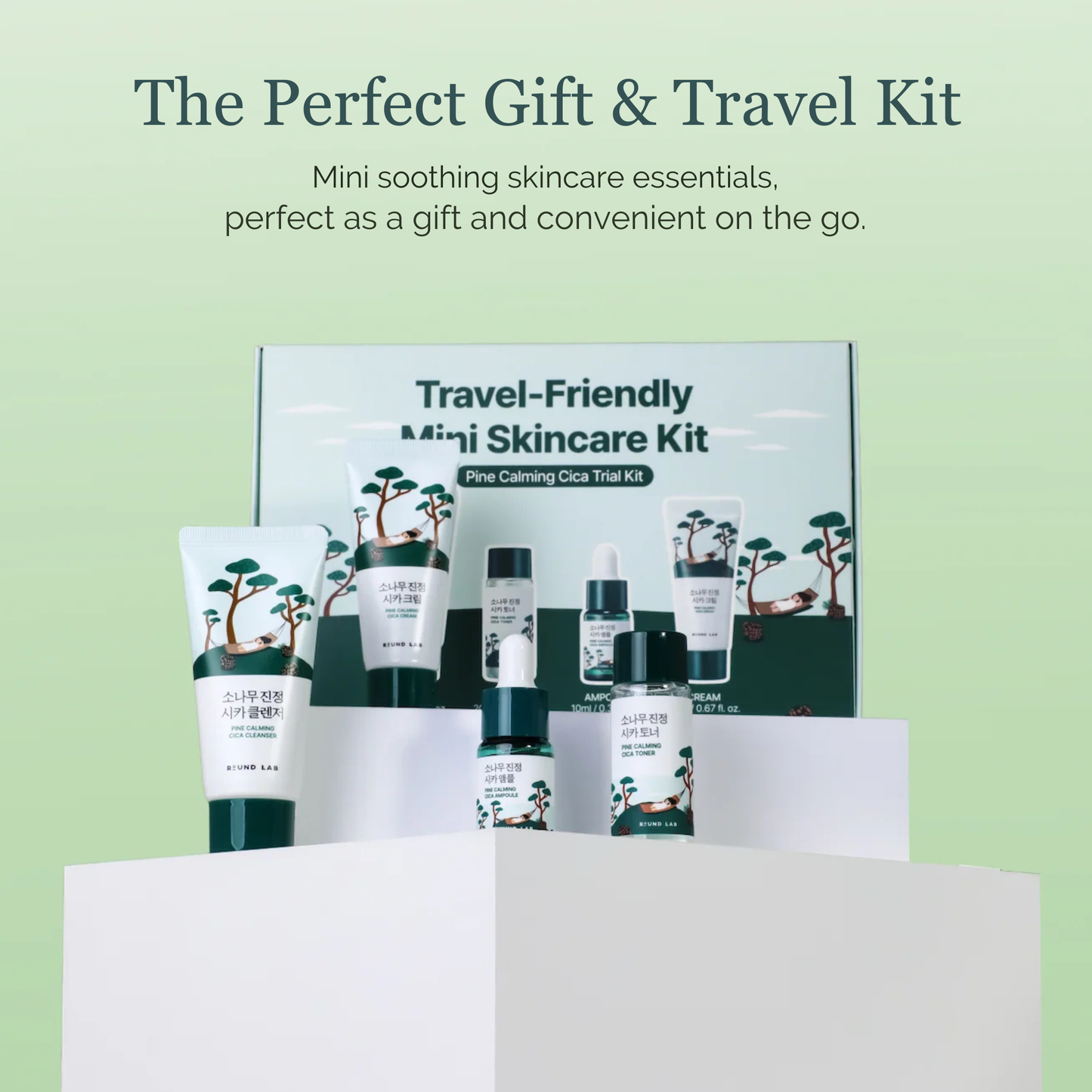 Round Lab Travel-friendly mini skincare kit displayed on white pedestals with its box behind it, set against a soft light green gradient background with promotional text at the top.