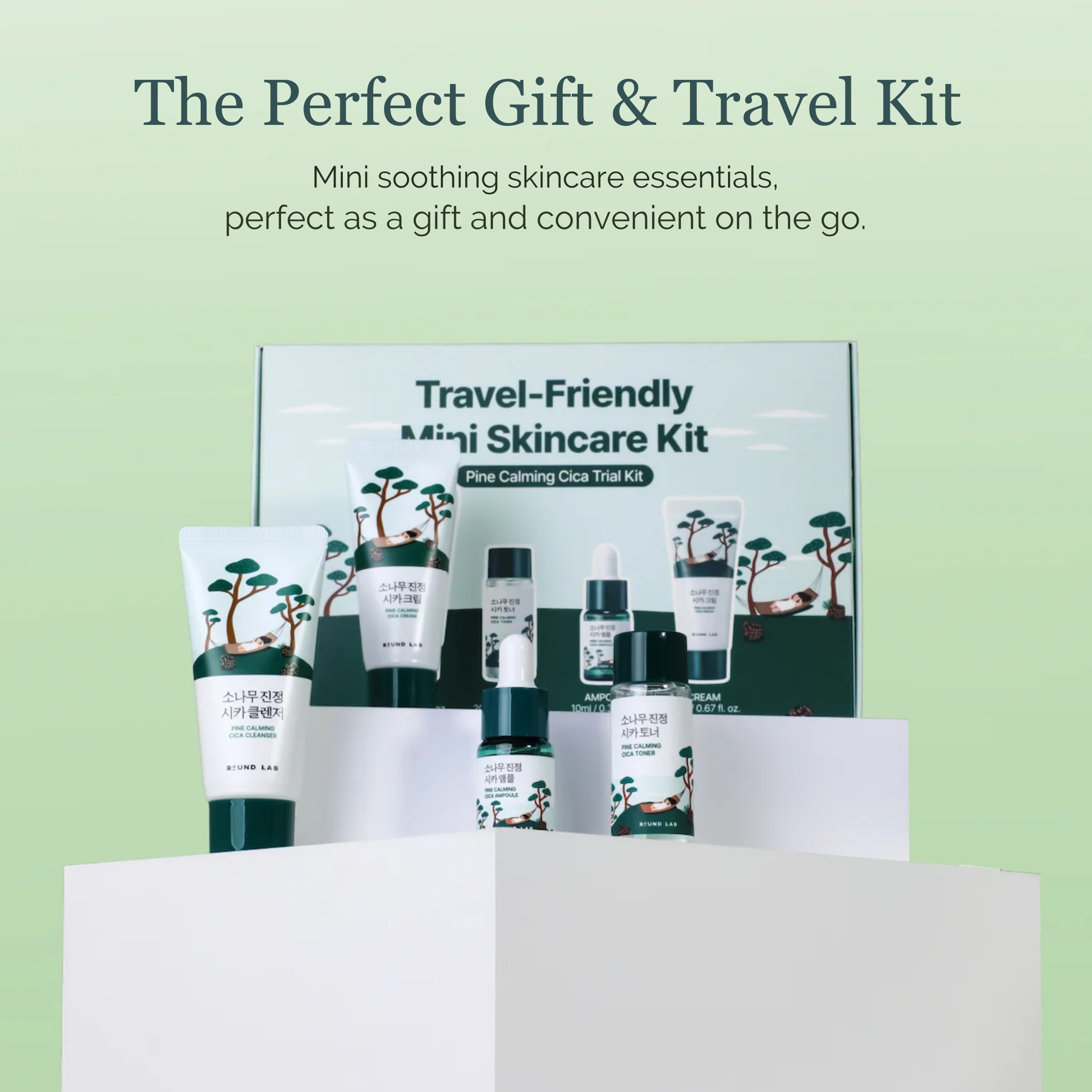 Round Lab Travel-friendly mini skincare kit displayed on white pedestals with its box behind it, set against a soft light green gradient background with promotional text at the top.