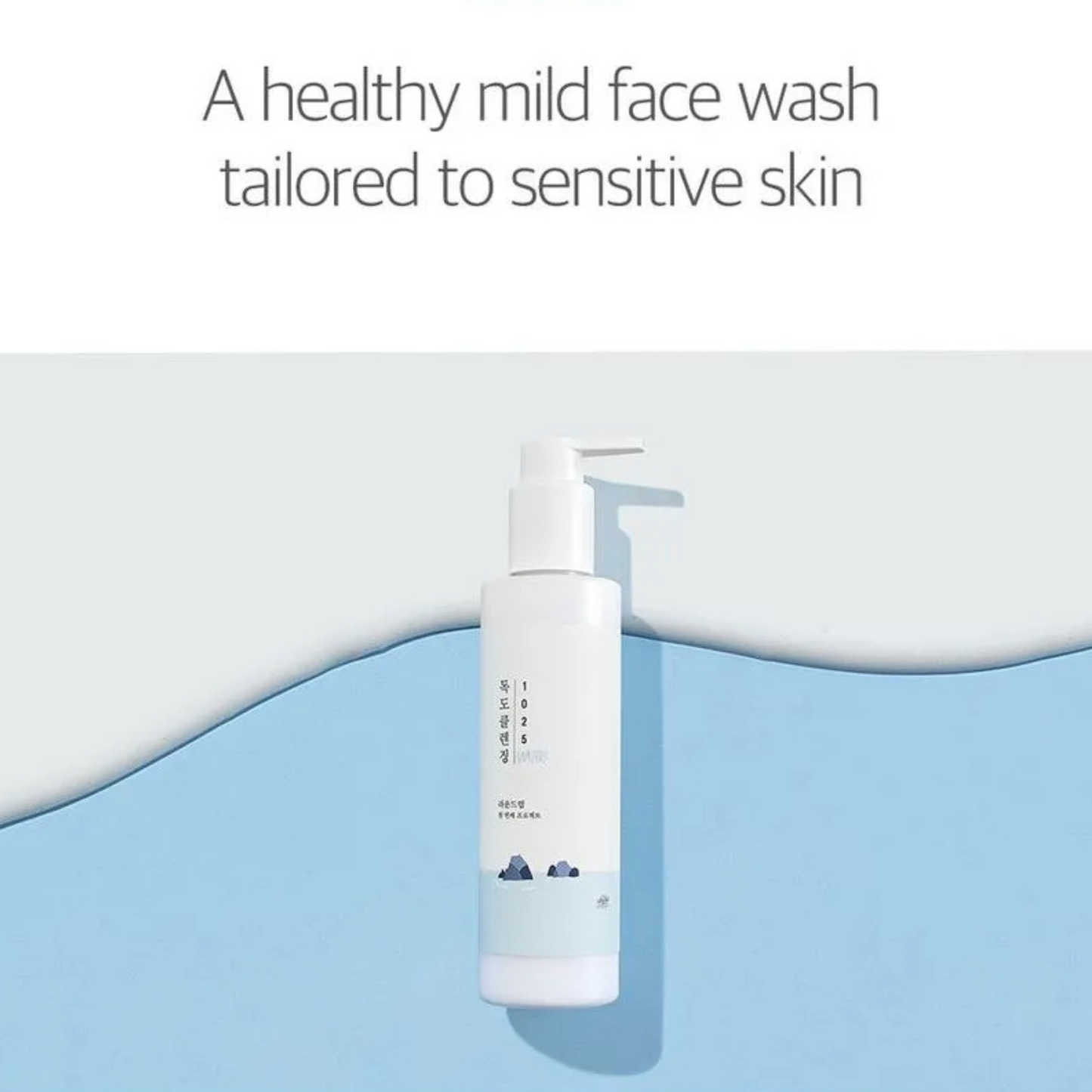 Round Lab 1025 Dokdo Cleansing Milk on a light blue background with text about sensitive skin.