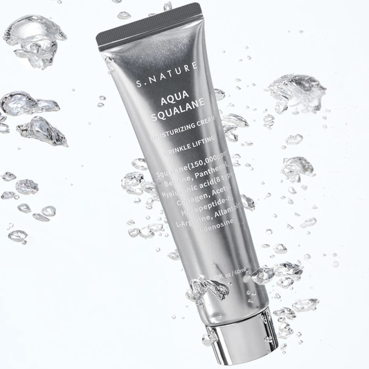 S.Nature Aqua Squalane moisturizing cream tube surrounded by water droplets on a white background