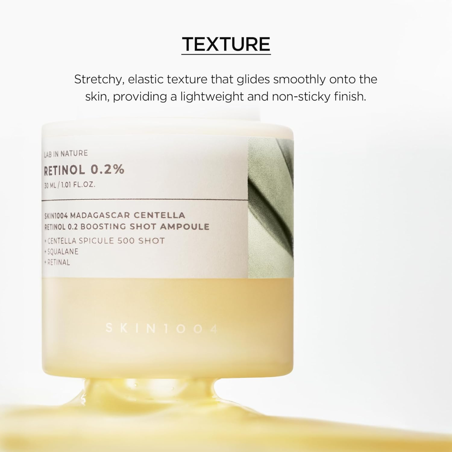 SKIN1004 Madagascar Centella Retinol 0.2 Boosting Shot Ampoule texture shot with text on the texture of the product