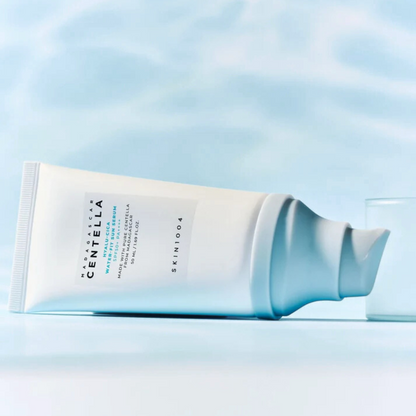 SKIN1004 Hyalu‑Cica Water‑Fit Sun Serum SPF 50+ PA++++ on a light blue background with water refleciton