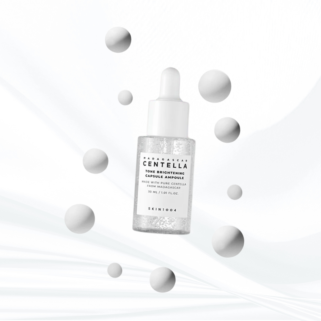 SKIN1004 Madagascar Centella Tone Brightening Capsule Ampoule with white floating bubbles representing capsules