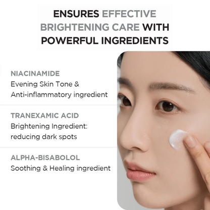 Text on the hero ingredients of the SKIN1004 Madagascar Centella Tone Brightening Capsule Cream with an image of a woman applying the cream to her cheek