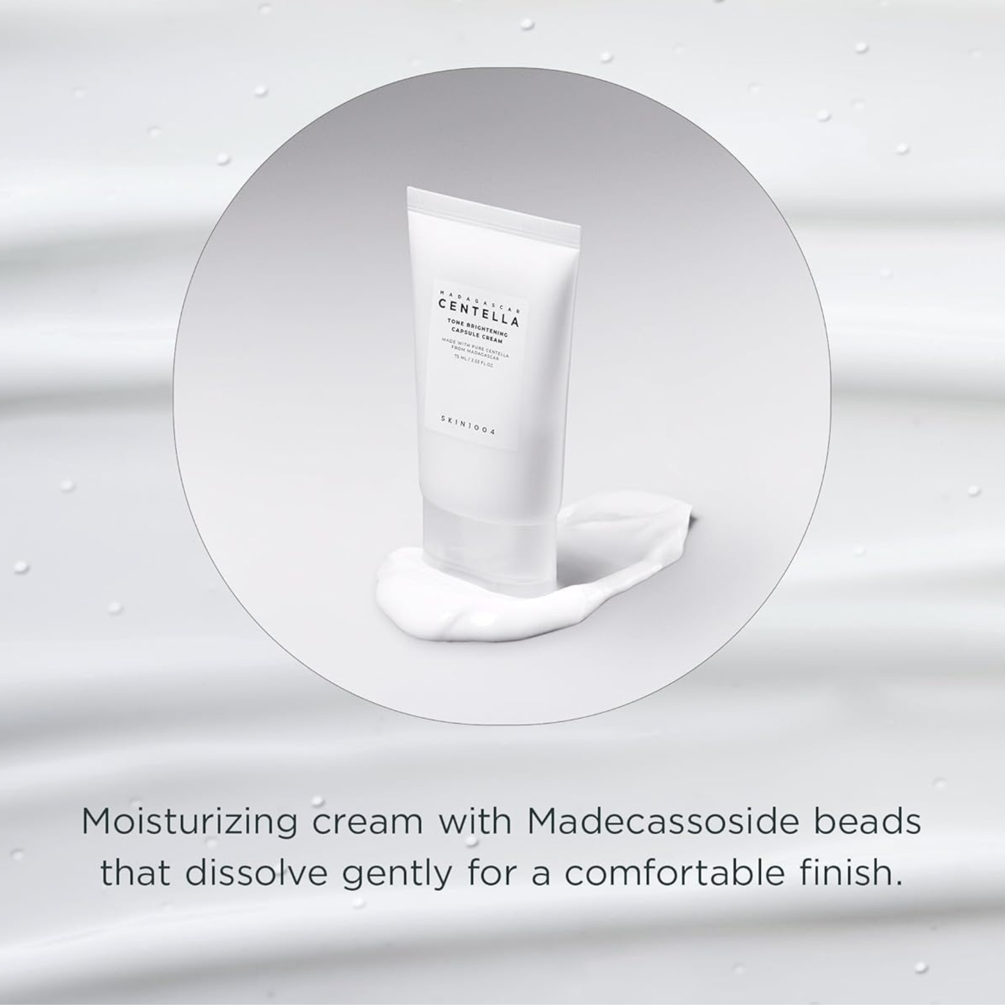 SKIN1004 Madagascar Centella Tone Brightening Capsule Cream sitting on top of cream. There is text about the Madecassoside beads that gently dissolve for a comfortable skin finish