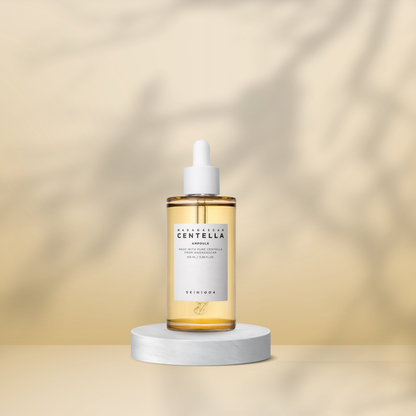 SKIN1004 Madagascar Centella Ampoule on a pedestal with a neutral background