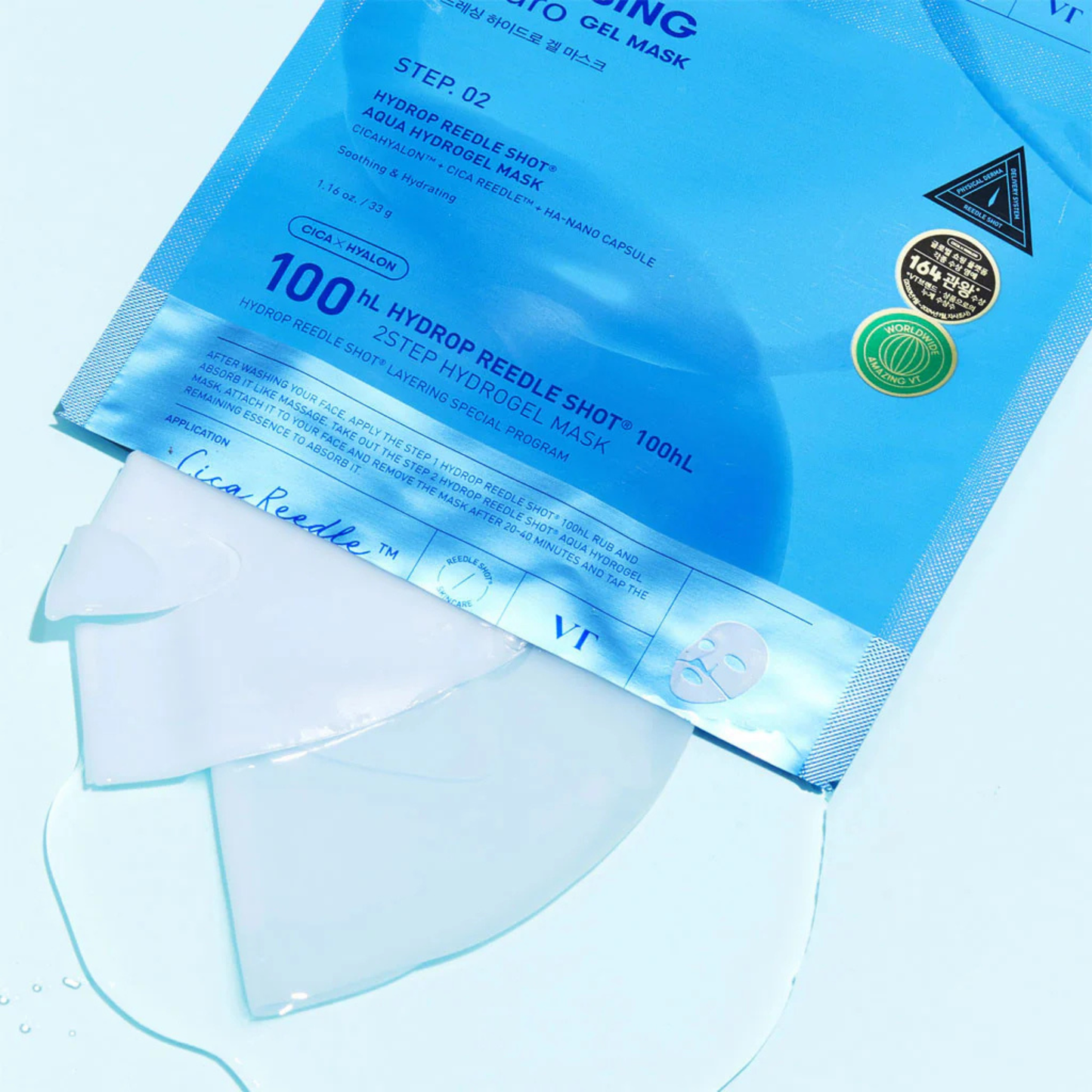 VT Cosmetics Hydrop Reedle Shot 100 2 Step Hydrogel Mask packaging and hydrogel mask with ampoule fluid on a light blue background