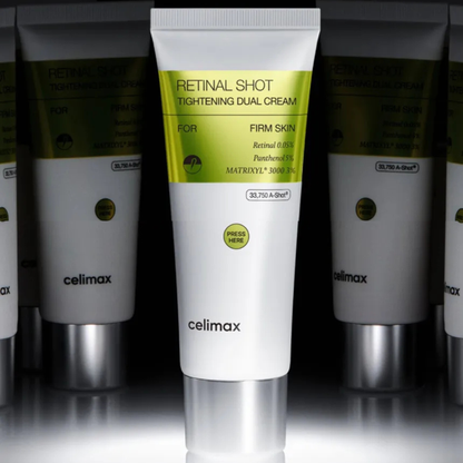 A white tube of Celimax Retinal Shot Tightening Dual Cream is centered, flanked by two partially visible identical tubes on a dark reflective studio background.