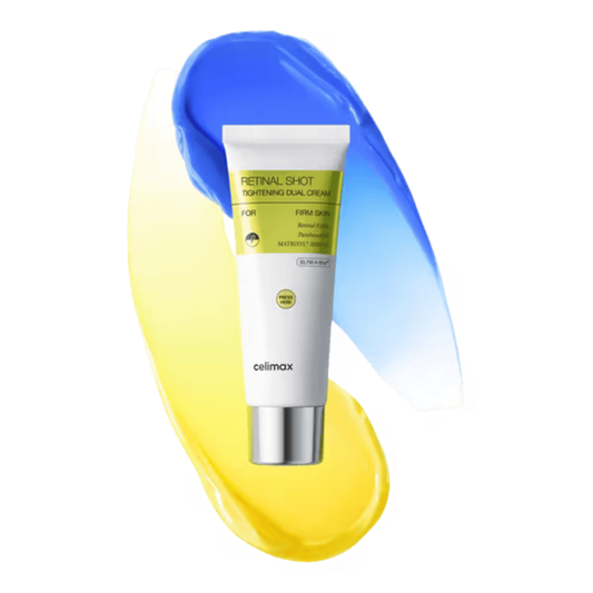 A white tube of Cellmax Retinal Shot Tightening Dual Cream with a silver cap, centered over a stylized yellow and blue cream smear on a white background.