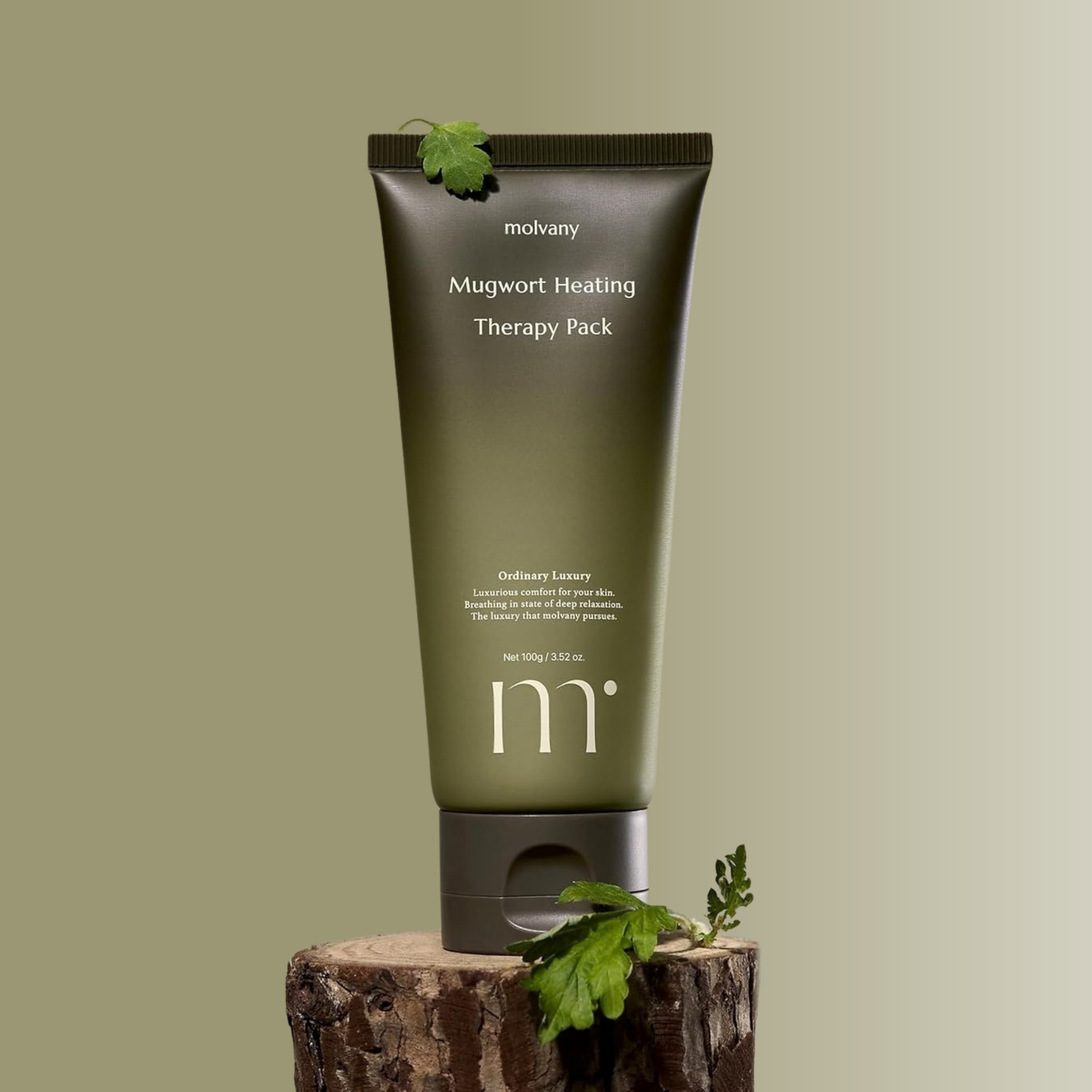 Molvany Mugwort Heating Therapy Pack on a wooden block with a green background